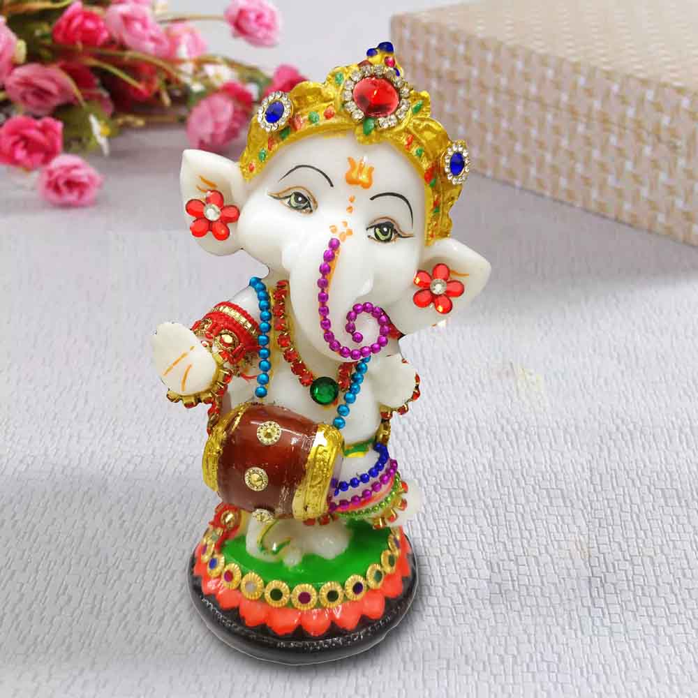  White Lord Ganesha Idol Playing Dholak